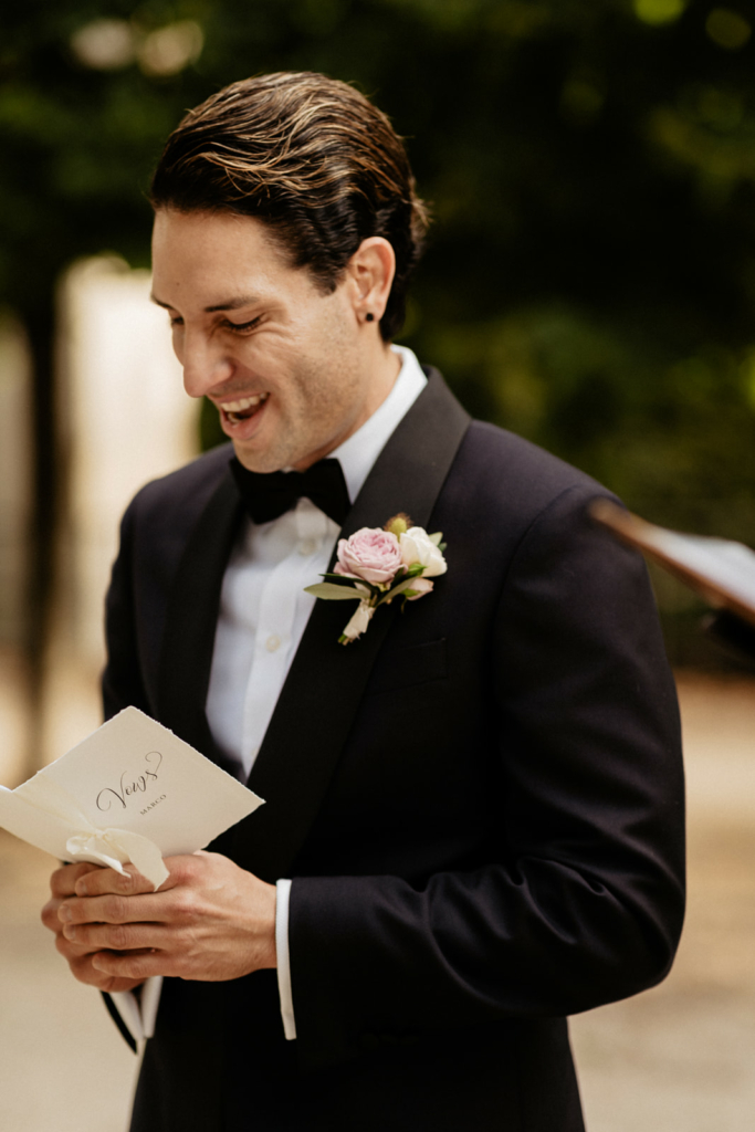 groom reads wedding vows elopement ceremony paris