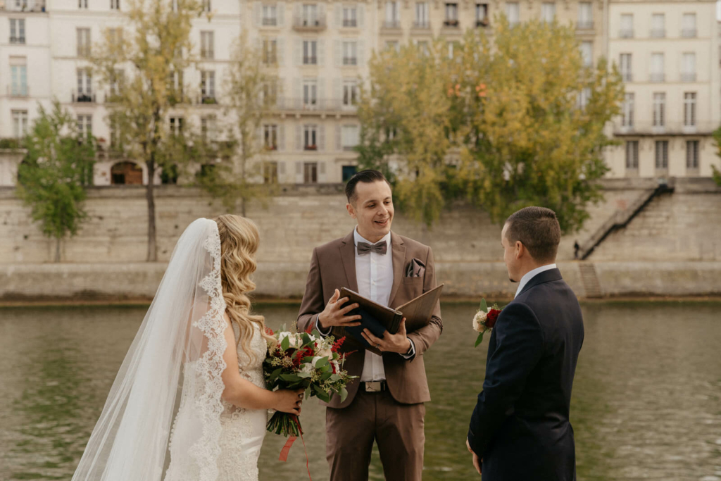 paris elopement at notre dame near the Seine with an english speaking paris officiant celebrant