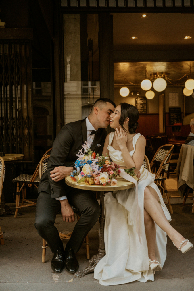 newlywed couple in paris cafe